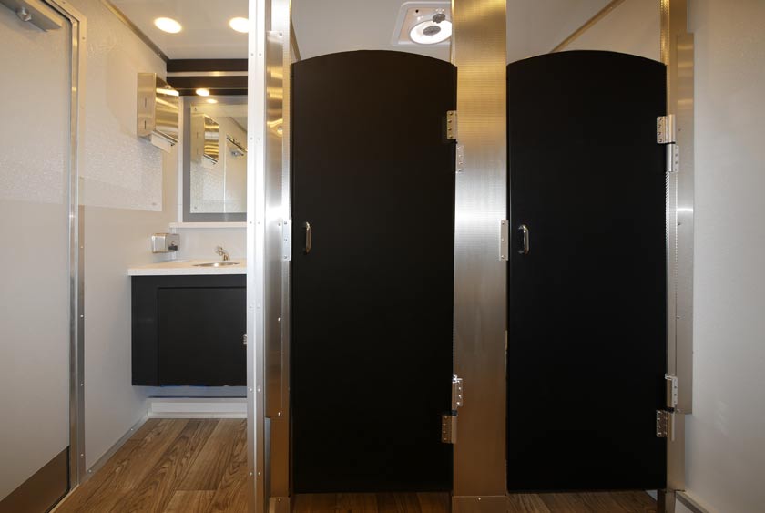 SECOND SINK VANITY IN MEN'S SIDE WITH 2 PRIVATE TOILET STALLS