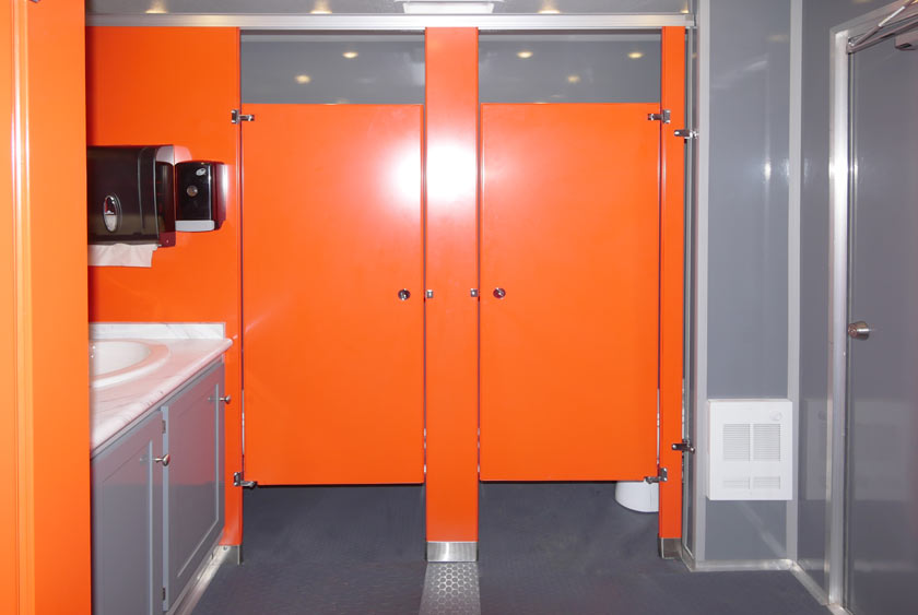 FUNCTIONAL VANITIES INCLUDE BUILT-IN TRASH RECEPTACLES