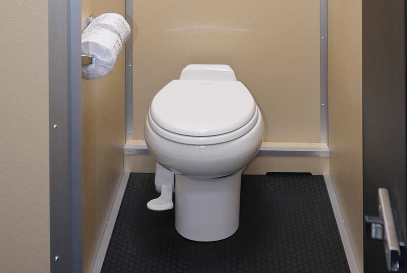 FULL SIZED PORCELAIN TOILETS WITH FOOT-PEDAL FLUSHING 