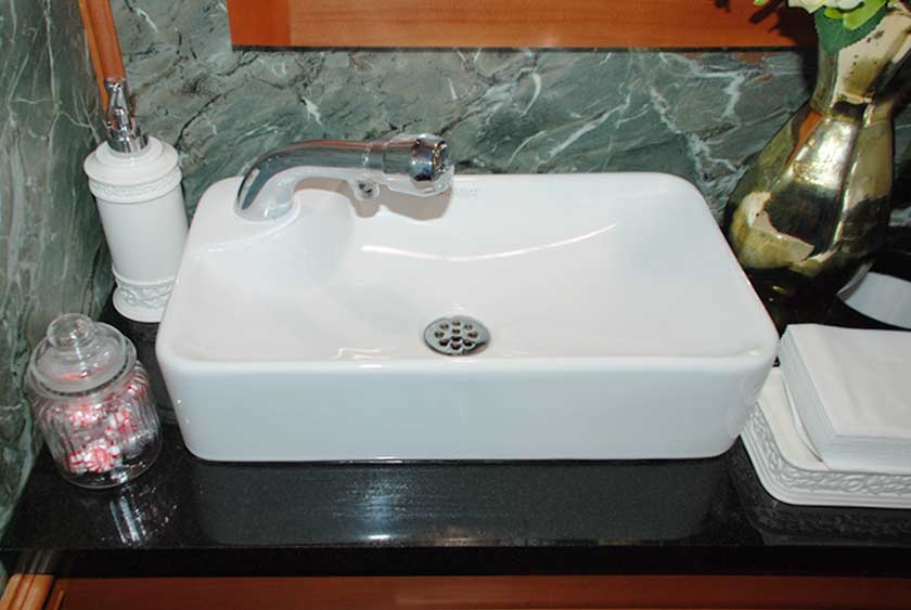 PORCELAIN VESSEL SINKS WITH AUTO-SHUTOFF FAUCETS