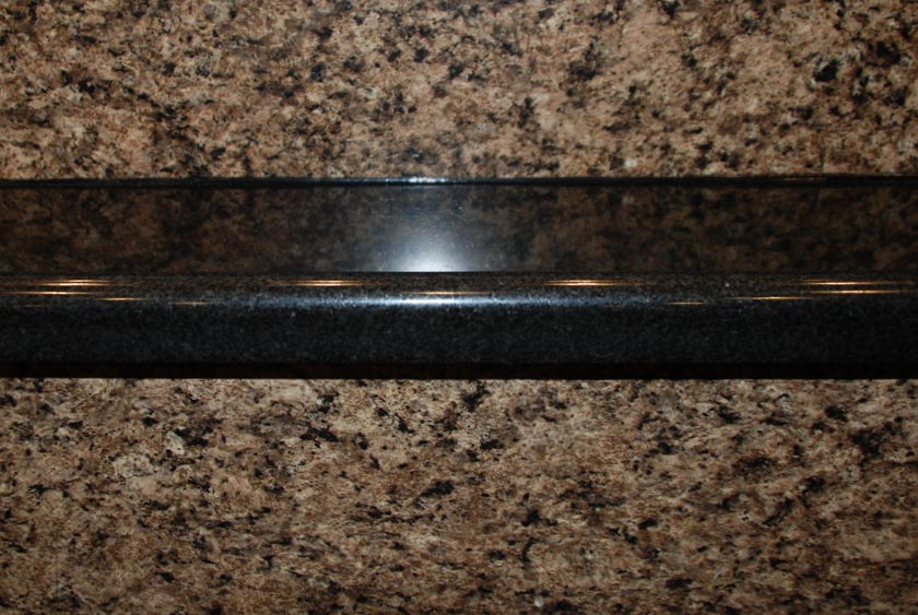 SEVEN FOOT WIDE SOLID MARBLE SHELF OVER MEN'S URINALS