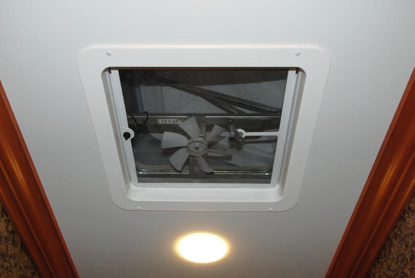 CEILING VENTS WITH FANS WITHIN EACH STALL