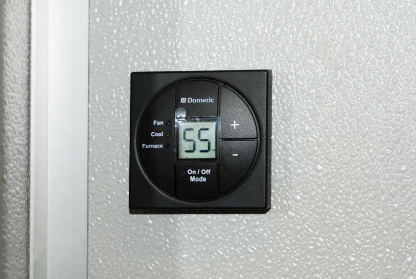 THERMOSTAT CONTROLLED A/C AND HEAT