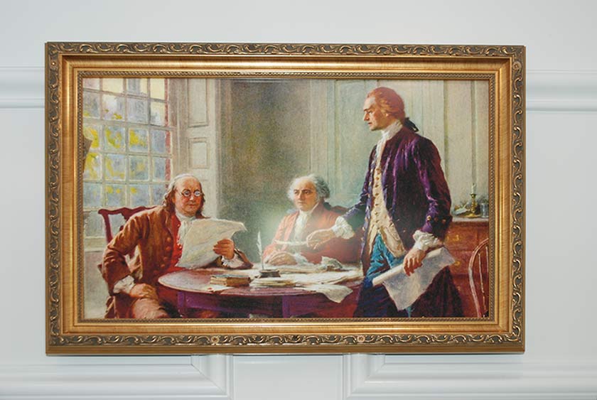 BEAUTIFUL GOLD-FRAMED ARTWORK THROUGHOUT BOTH RESTROOMS