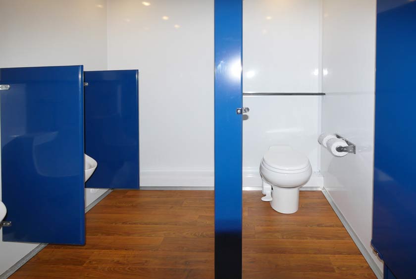 MEN'S SIDE INCLUDES ONE BATHROOM STALL AND THREE URINALS