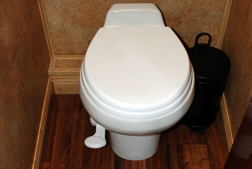 MEN'S BATHROOM INCLUDES TWO FULLY-ENCLOSED PRIVATE STALLS