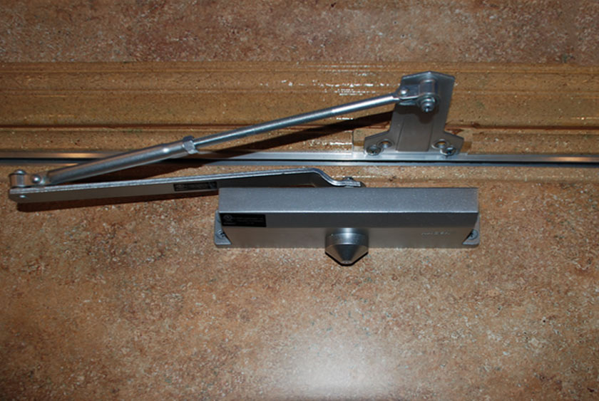 SELF CLOSING ENTRANCE AND EXIT DOORS