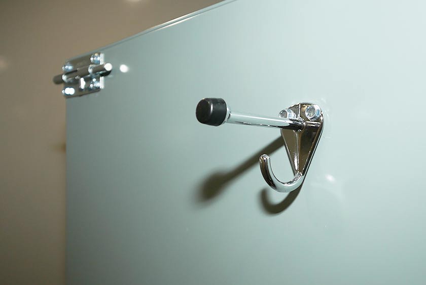 COAT/HAT HOOKS INSIDE EACH DOUBLE-LOCK TOILET STALL