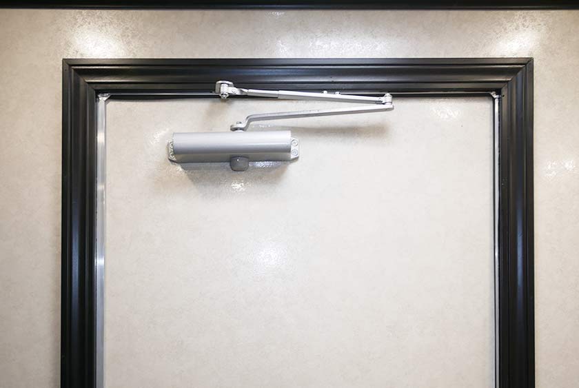 AUTOMATIC DOOR CLOSERS FOR SAFETY AND PRIVACY