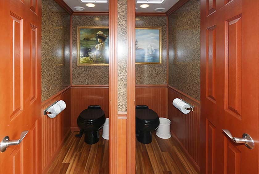 FULL SIZED RESTROOMS WITH FLOOR TO CEILING, LOCKABLE DOORS