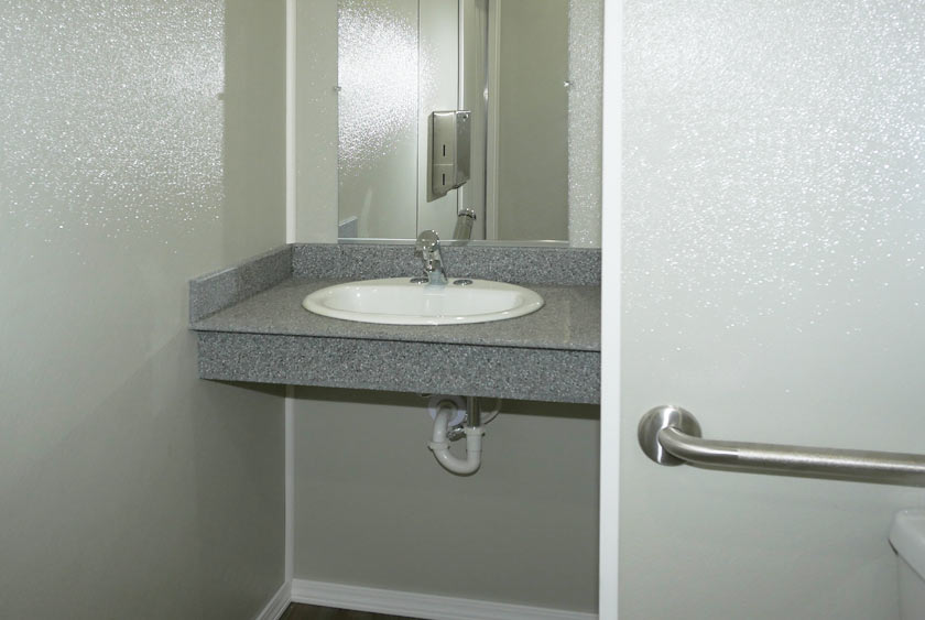 LADIES RESTROOM VANITY WITH FRAMED MIRROR