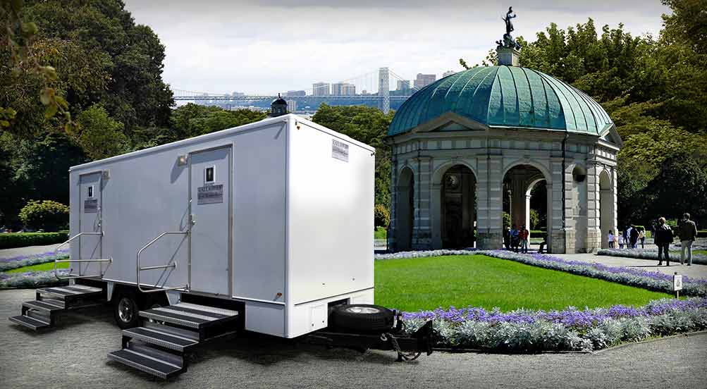 The White Horse Luxury Restroom Trailer In The City