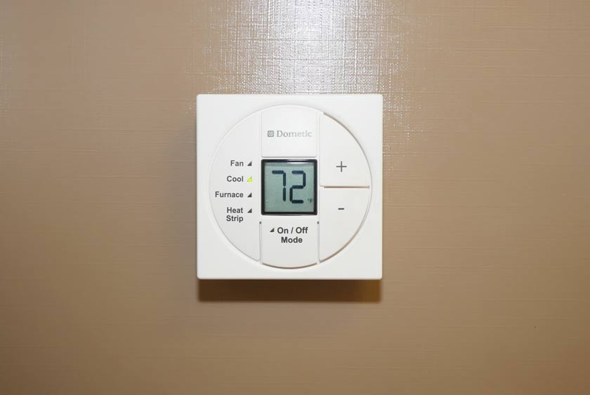 THERMOSTAT CONTROLLED AIR CONDITIONING FOR SUMMER COMFORT