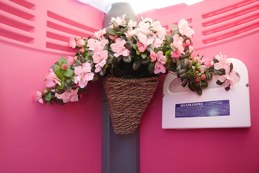 FLORAL ARRANGEMENT ADDS CHARM TO THIS UNIQUE RESTROOM
