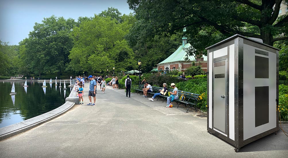 White Wash Portable Restroom | Green Colored White Wash Portable Restroom Inside an Underground Tunnel