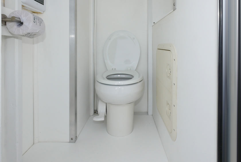 FULL SIZED PORCELAIN TOILET WITH FOOT PEDAL FLUSH